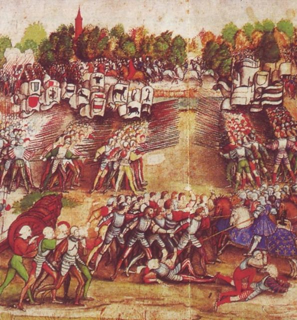 The Swiss (on the left) assault the Landsknecht mercenaries in the French lines at the Battle of Marignano. Source: Wikipedia
