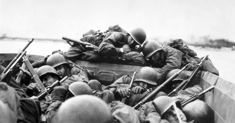 Soldiers from the 89th Division cross the Rhine River in assault boats, 1945.