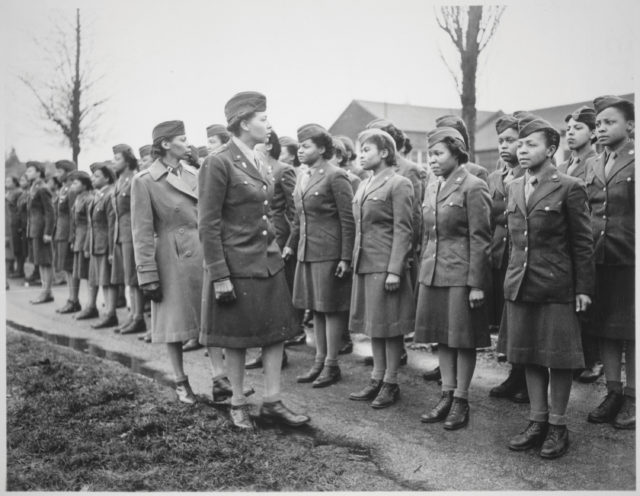 Adams inspecting her troops Image Source: 