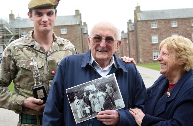 Photo Caption:- Major Martin Stanning, OC C Company with Dr Ian Morrison and family member Shiela Thomson