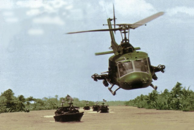 UH-1E_of_HAL-3_escorting_PBRs_in_Vietnam_c1968