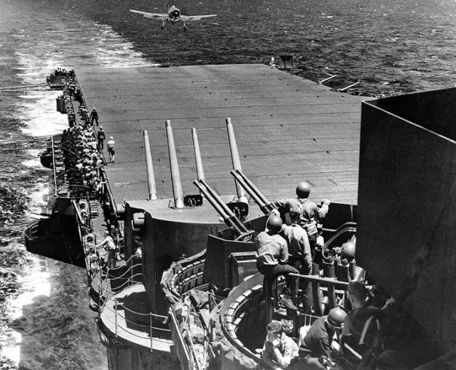 F6F-3 landing aboard Lexington (CV-16) — Task Force 58 flagship. By Official US Navy Photograph. (Enhancement by DLJ - Wild Surmise) - US Navy images, Public Domain, 