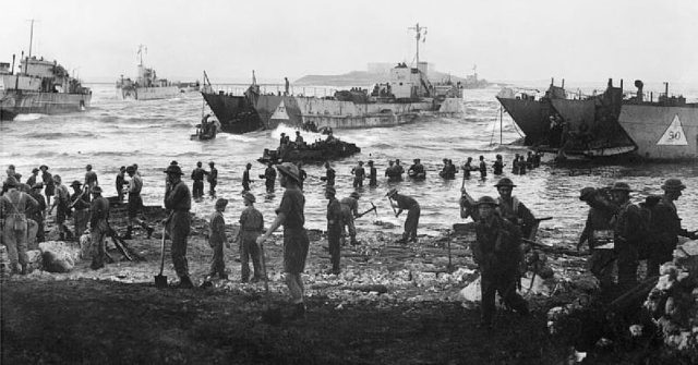 British Troops on the shores of Sicily, 10th of July, 1943. By Parnall, C H (Lt), Royal Navy official photographer - http://media.iwm.org.uk/iwm/mediaLib//30/media-30134/large.jpgThis is photograph A 17916 from the collections of the Imperial War Museums., Public Domain.