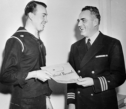 William Hitler receiving his discharge papers from the US Navy in 1947 Image Source: