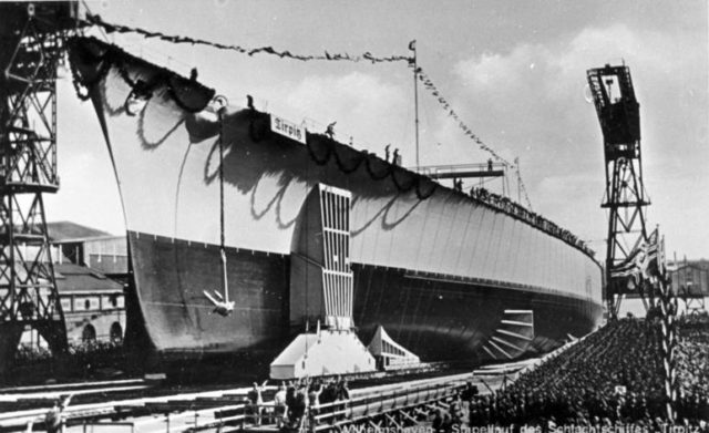 Tirpitz sliding down the slipway at her launch. Photo Credit.