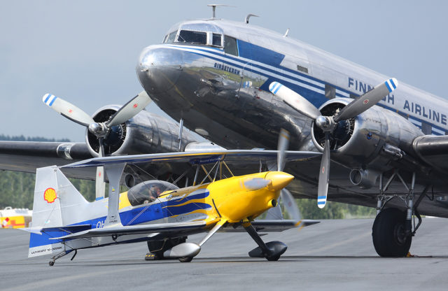 Finnish Airlines Douglas DC-3 and Ultimate 10-300S at Tour-de-Sky airshow at Kuopio, Finand. (Photo by Fyodor Borisov/Transport-Photo Images)