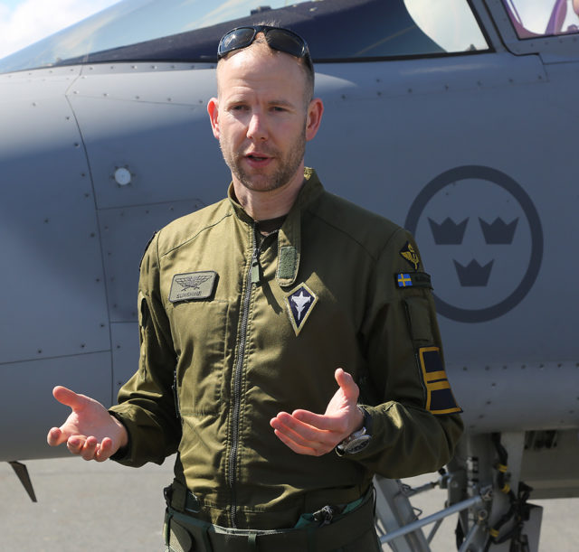 Swedish pilot in front of his aircraft. (Photo by Fyodor Borisov/Transport-Photo Images)