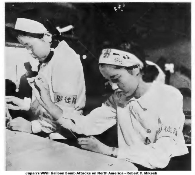 Japanese teens working on the balloon envelope Image Source: