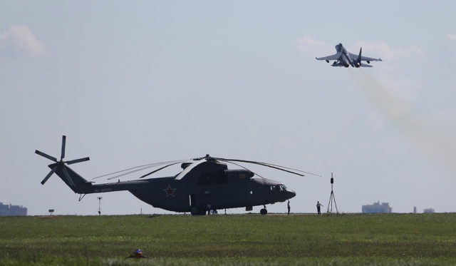 Russian Airforce Mil Mi-26 helicopter and Sukhoi Su-35 fighter at Aviadarts military exercise at Dyagilevo Airbase, Ryazan. Russia. (Photo by Fyodor Borisov/Transport-Photo Images)