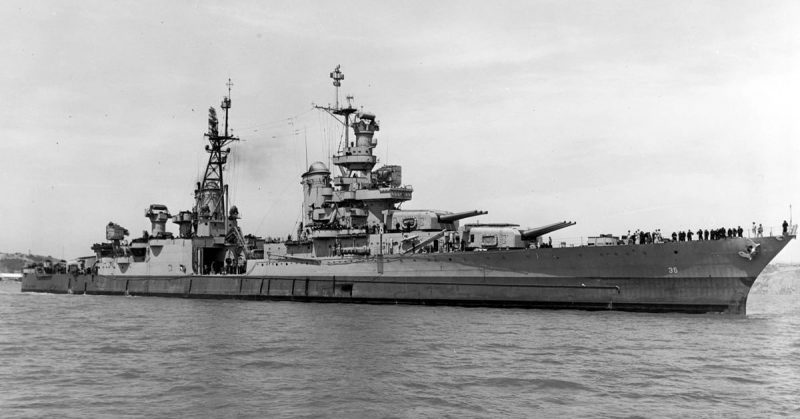 USS Indianapolis (CA-35) is shown off the Mare Island Navy Yard, in Northern California, July 10, 1945, after her final overhaul and repair of combat damage. The photo was taken before the ship delivered atomic bomb components to Tinian and just 20 days before she was sunk by a Japanese submarine. Source: Wikipedia / Public Domain