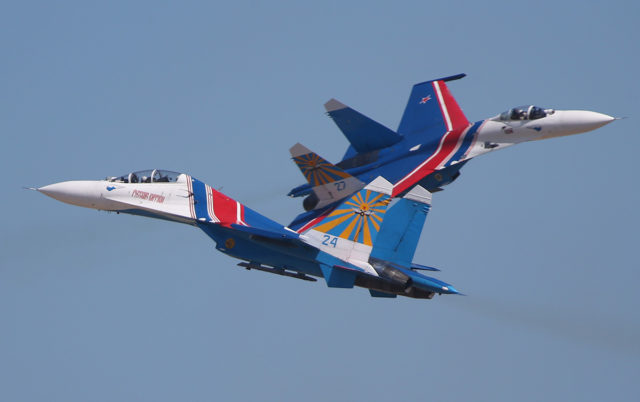 The Russian Airforce aerobatic group 'Russian Knights' at Sukhoi Su-27 at Aviadarts military exercise at Dubrovichi Air Range. (Photo by Fyodor Borisov/Transport-Photo Images)