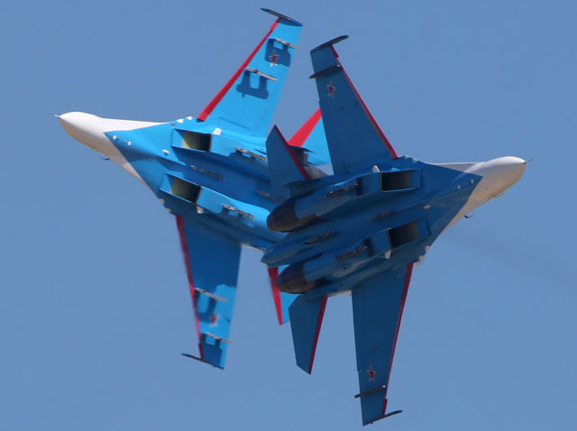 The Russian Airforce aerobatic group 'Russian Knights' at Sukhoi Su-27 at Aviadarts military exercise at Dubrovichi Air Range. (Photo by Fyodor Borisov/Transport-Photo Images)