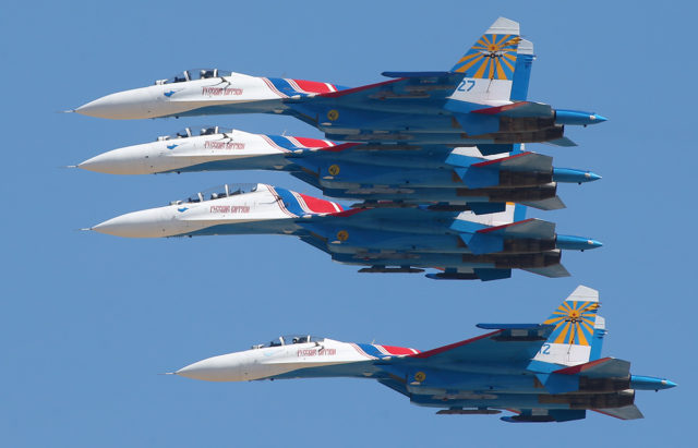 The Russian Airforce aerobatic group 'Russian Knights' at Sukhoi Su-27 at Aviadarts military exercise at Dubrovichi Air Range. (Photo by Fyodor Borisov/Transport-Photo Images)