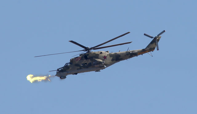 The Mil Mi-24 military helicopter at Aviadarts military exercise at Dubrovichi Air Range. (Photo by Fyodor Borisov/Transport-Photo Images)