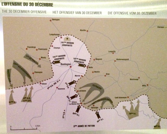 The photo above shows the map of Bastogne in the center while being surrounded by the SS Panzer Units. The great final German counterattack against the Allied Forces outside their Homeland had started by mid-December 1944 and came as a total surprise. The 101 Airborne Division that was defending the Bastogne area soon found itself beleaguered by those German Tank Battalions and Infantry. Their situation soon became precarious as it was no longer possible to get sufficient supplies of food, fuel, ammo and medicaments for an ever growing number of wounded soldiers.