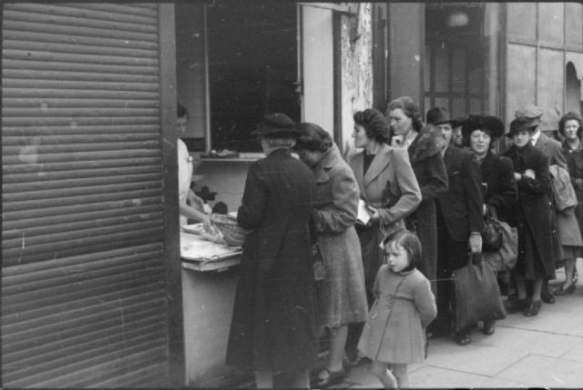 British Ration Queue, London, 1945. Wikipedia / Public Domain