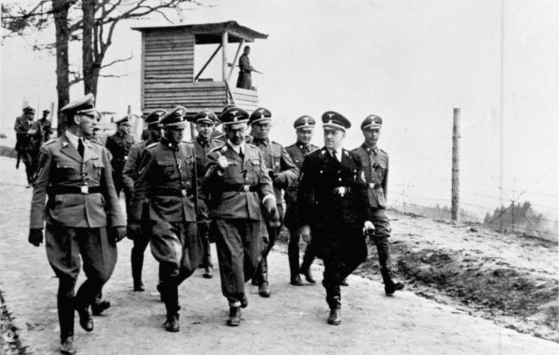 Himmler, Ernst Kaltenbrunner, and other SS officials visiting Mauthausen concentration camp in 1941.  Source: By Bundesarchiv, Bild 183-45534-0005 / CC-BY-SA 3.0, CC BY-SA 3.0 de, https://commons.wikimedia.org/w/index.php?curid=5353701