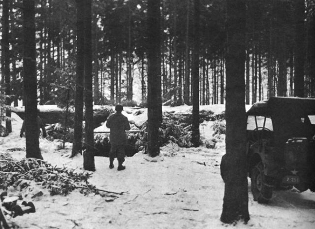 The defensive positions around Krinkelt, wooden pillboxes and hastily dug foxholes served as the sole fortifications for the desperate American defense of the town. Image Source: Wikimedia Commons/ public domain.