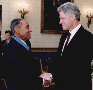 President Bill Clinton giving Baker his Medal of Honor Image Source: Wikipedia / Public Domain
