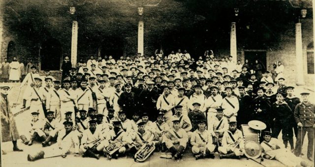 The crew of the German commerce raider SMS Emden taken shortly before the outbreak of the First World War where many of the crew would be captured or killed after an engagement with the Royal Australian Navy. Wikipedia / Public Domain