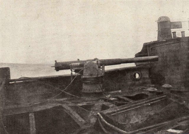 one of the two hidden cannons onboard the Seeadler. You can see the section of deck railing which would pop down, allowing the gun full movement, while concealing it when not in use. This ingenuity allowed them to appear and nonthreatening as possible, until the very last moment when the entire crew would strike their target. Source: Wiki/public domain