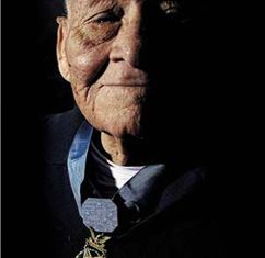 Master Sgt. Jose Lopez, proudly displaying his medal of honor. Image Source: Wikimedia Commons/ Public Domain 