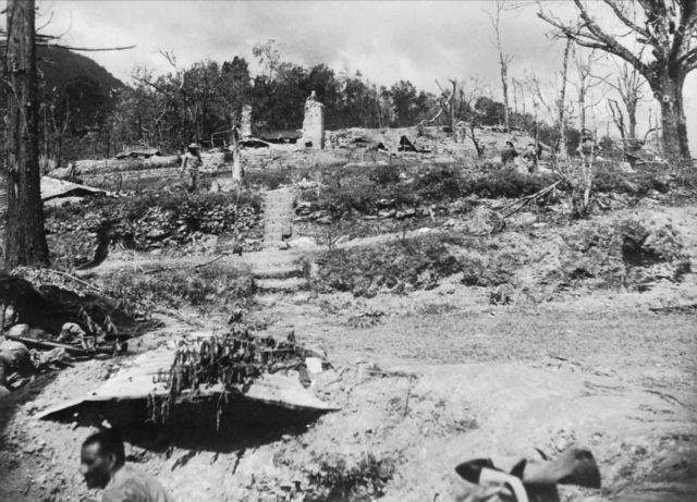 The battered, shelled, mined, and entrenched tennis court after the battle. Source: Wiki/ public domain.