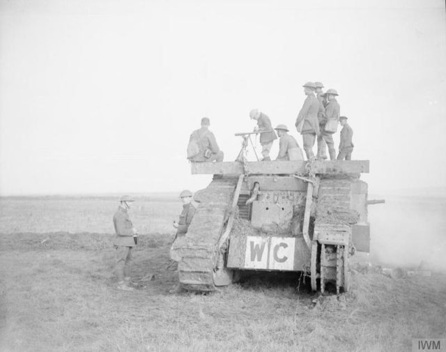 Even a destroyed tank was useful. This one is getting used as an observation post for lead elements of the assault. Source: wiki/ public domain