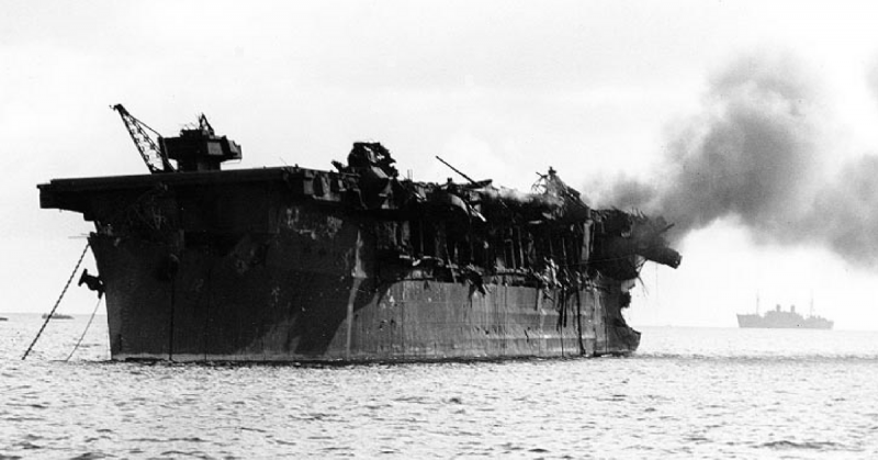 The U.S. light aircraft carrier USS Independence (CVL-22) afire aft, soon after the "Able Day" atomic bomb air burst test at Bikini on 1 July 1951. Wikipedia / Public Domain