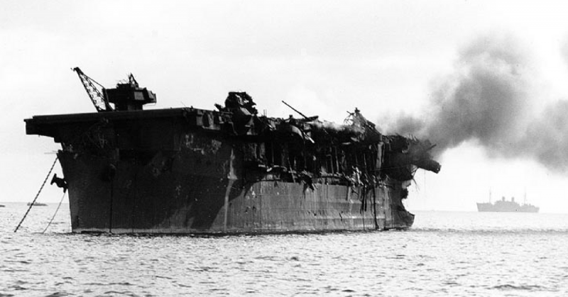 The U.S. light aircraft carrier USS Independence (CVL-22) afire aft, soon after the 