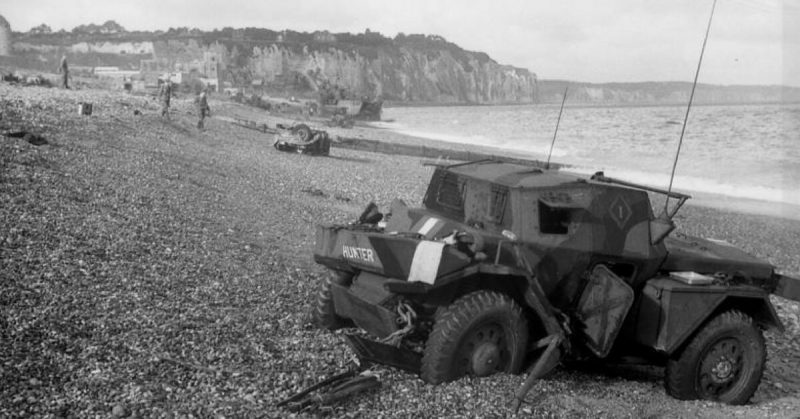 Dieppe's chert beach and cliff immediately following the raid on 19 August 1942. A Dingo Scout Car has been abandoned. By Bundesarchiv - CC BY-SA 3.0 de