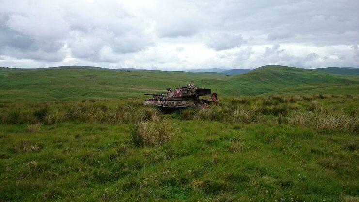 Rusty Chieftain tank in the middle of a field