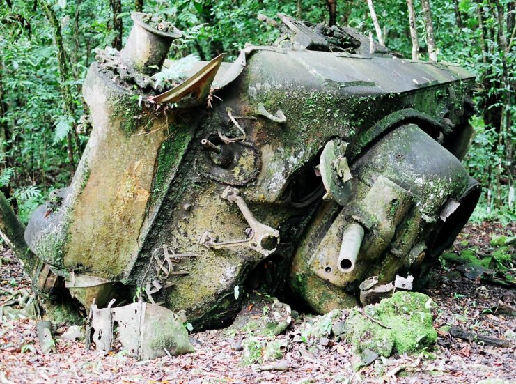 Overturned M4 Sherman covered in moss