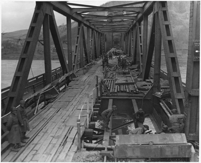 Combat Engineers repairing the Ludendorff Bridge on 17 March 1945 four hours before it collapsed (Wikipedia / Public Domain)