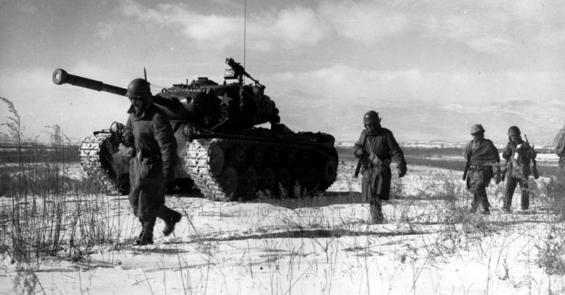 US Marine Corps in Korean War, moving through Chinese lines during their breakout from the Chosin Reservoir.