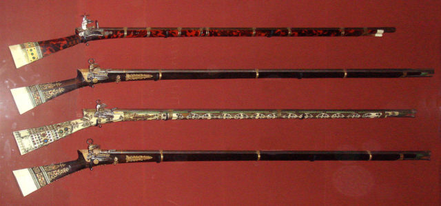 Janissary rifles from the year 1826. By PHGCOM – Own work by uploader, photographed at Musee de l’Armee, Paris, CC BY-SA 3.0, https://commons.wikimedia.org/w/index.php?curid=7662924
