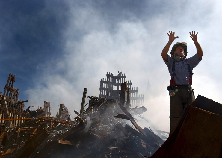 A New York City fireman calls for 10 more rescue workers to make their way into the rubble of the World Trade Center.