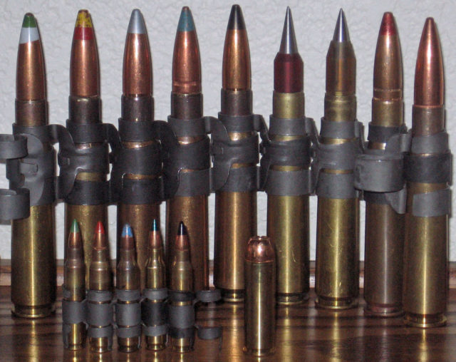 A selection of .50 Cal rounds with different functions, armour piercing, incendiary, tracer, spotter. .223 rounds in front, and a .500 magnum round for size comparison. This awesome pic is by English Wikipedia User Aki009 , used with permission.