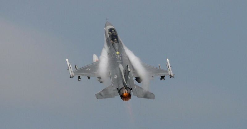 An F-16D Fighting Falcon, piloted by Col. John R. DiDonna, the commander of the New Jersey Air National Guard’s 177th Fighter Wing, takes off in afterburner with Brig. Gen. Robert C. Bolton in the back seat for his 