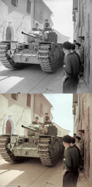 The British Army in Italy 1944 A Churchill IV (NA 75) tank of 25th Tank Brigade passes through the narrow streets of Montefiore, 11 September 1944. NA 75 versions of the Churchill were fitted with 75mm guns from salvaged Sherman tanks