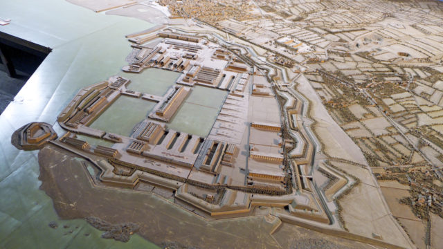 A relief of the Cherbourg Arsenal, built in 1872. The complex was decimated during WW2, which delayed the Allied use of the port, as they had to remove all of the debris. Fort du Homet can be seen on the lower left.