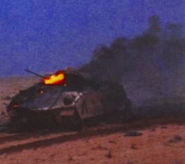 Bradley IFV burns after being hit by Iraqi T-72 fire.