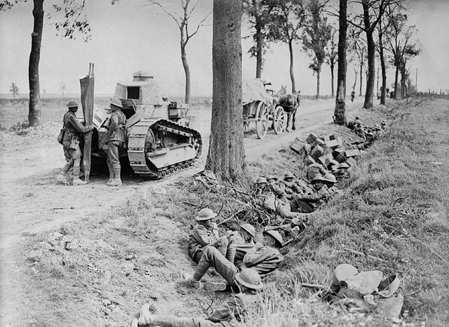 Canadian troops shelter in a ditch along the Arras-Cambrai road.