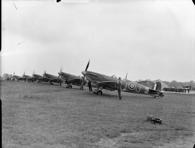 A flight of Supermarine Spitfire Mk VBs of No. 92 Squadron RAF with engines running at Biggin Hill, Kent.