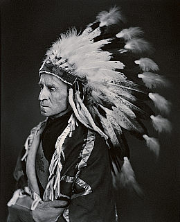 The Lord Tweedsmuir in Native headdress, 1937