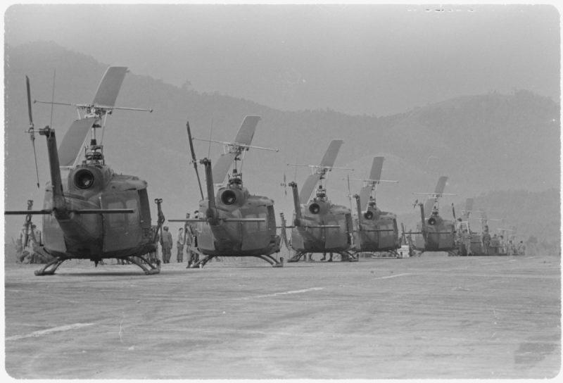 Helicopters of the 170th and the 189th Helicopter Assault Companies, await the leading of troops at Polei Kleng, in the Central Highlands of the Republic of South Vietnam, 1969. 