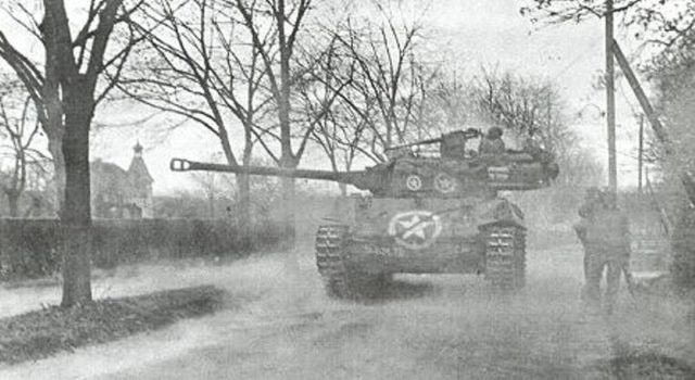 M18 Hellcat of the 824th Tank Destroyer Battalion in action at Wiesloch, Germany, April 1945. 