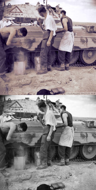 The crew of a Crusader tank have a wash and shave by the side of their vehicle, March 1942. Note the roughly applied camouflage paint on the trackguards