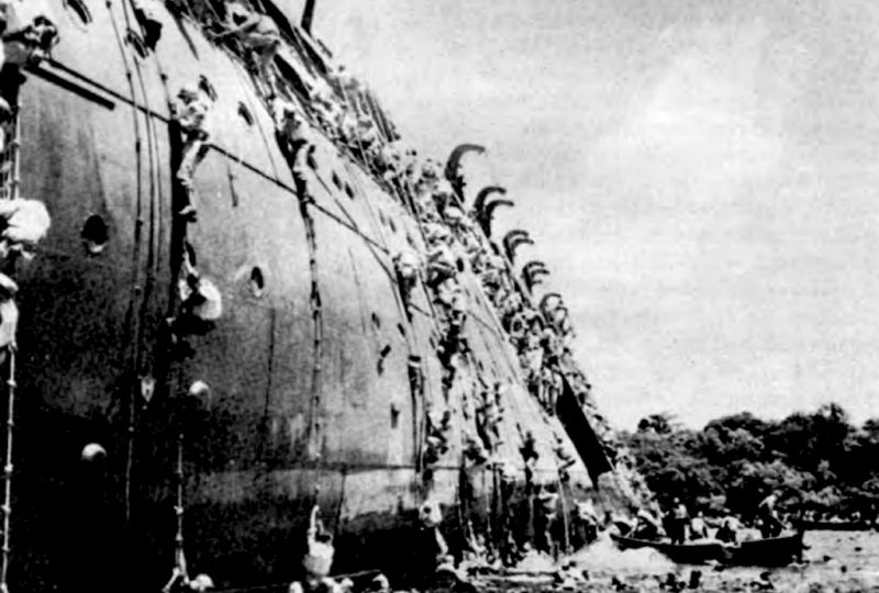 SS President Coolidge being abandoned after beaching, 1942. 