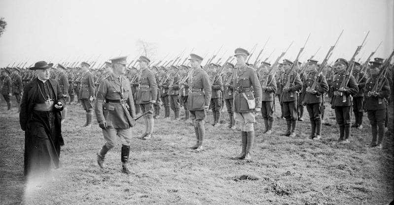 Inspecting troops of the 8/9th Battalion, Royal Dublin Fusiliers (48th Brigade, 16th Division) at Ervillers, 27 October 1917. Wikipedia / Public Domain